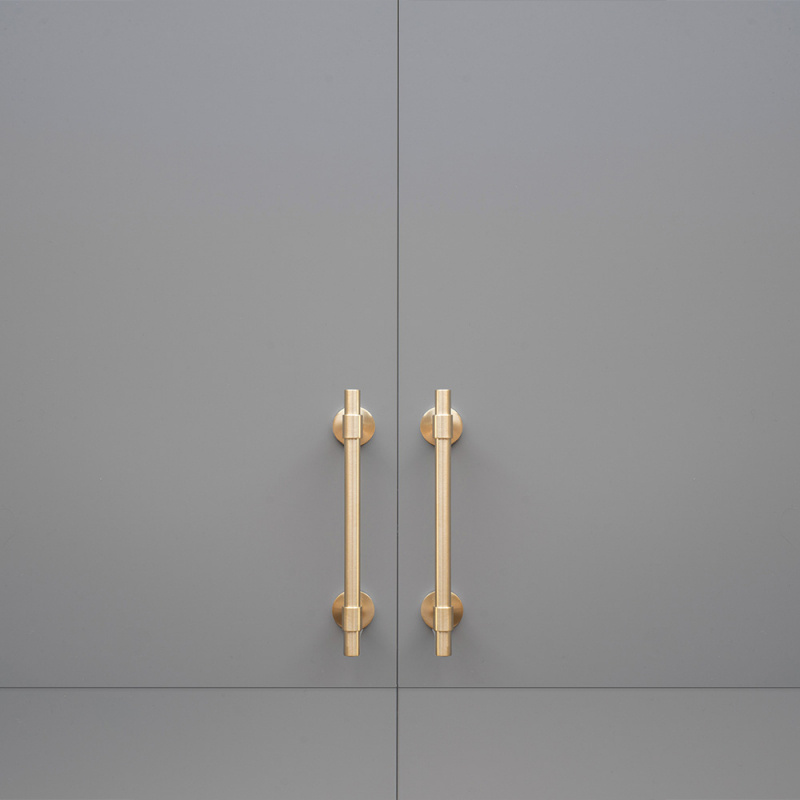 Håndtak Uniform - 128mm - Børstet ubehandlet messing