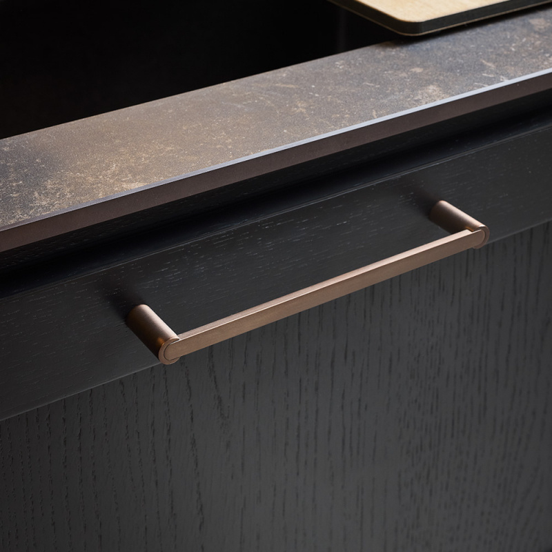 Håndtak Flow - Brunet messing